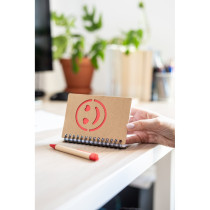Notatnik ok. B7 "uśmiechnięta buzia" z długopisem z logo firmy w LazyStore!